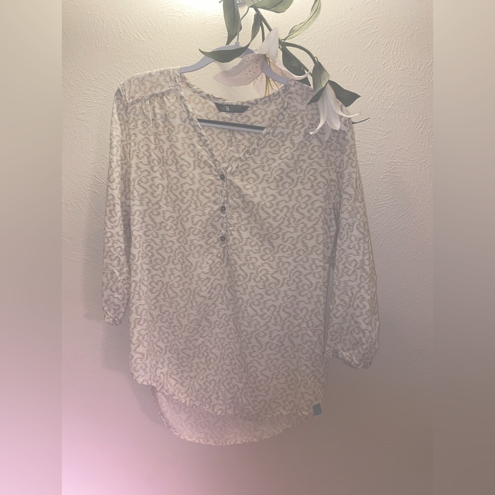 The North Face women’s 3/4 sleeve top. Size M.